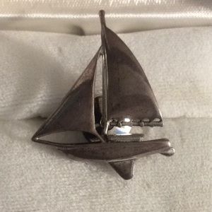 Silver sailboat brooch/pin.
